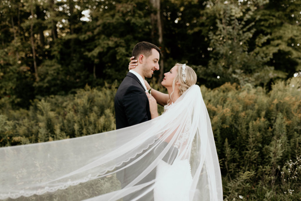Long Veil Bride and Groom Outdoor Wedding Portrait Photo