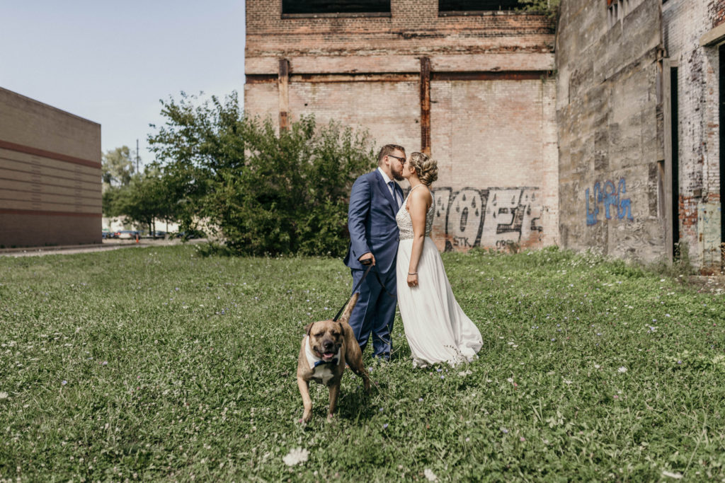 Bride and Groom and dog Wedding Portrait Photo