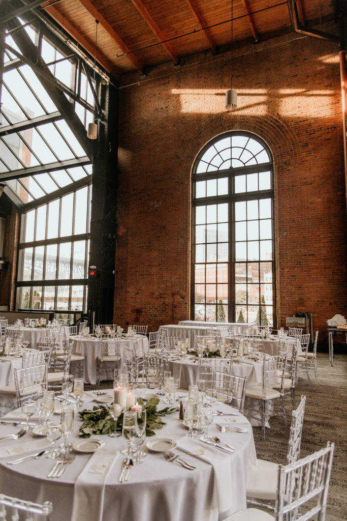 dining table set up at industrial wedding venue