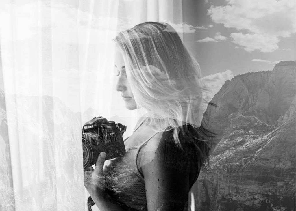 Arastasia holding camera looking out window with zion national park mountains overlayed